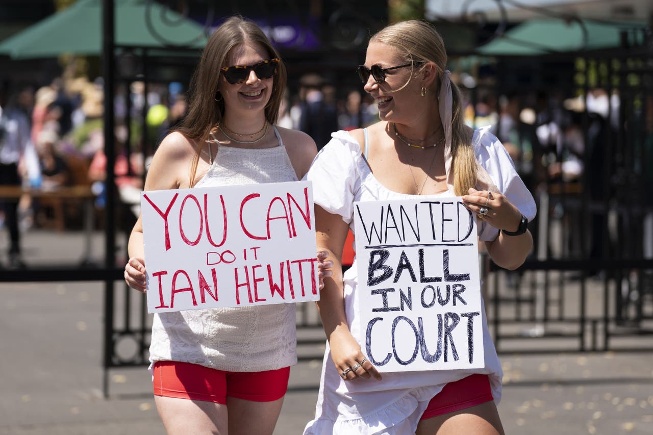 Group in red shorts protest against Wimbledon dress code over period