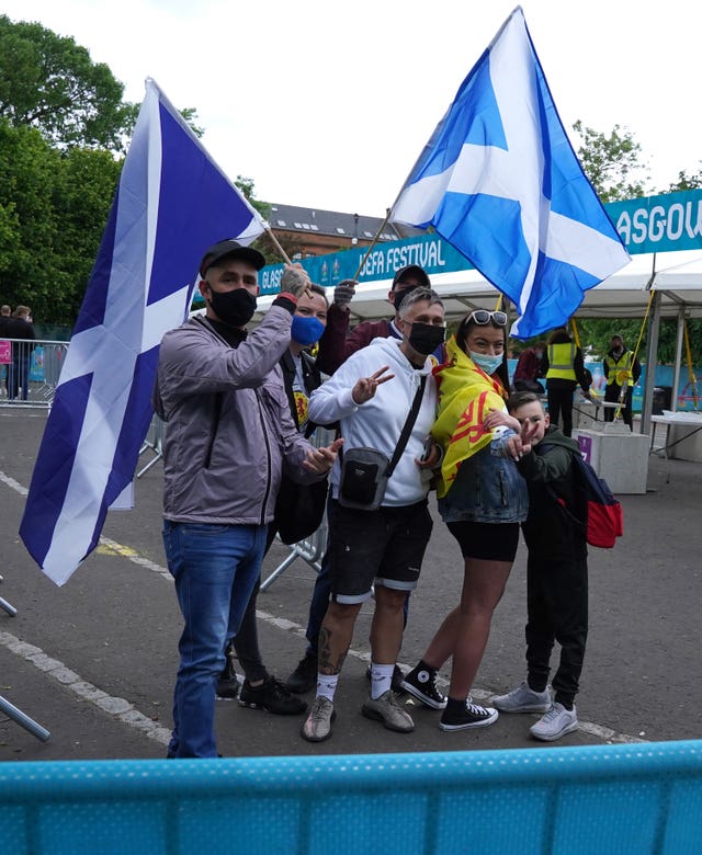 Fans arrive at the Glasgow Green Fan Zone