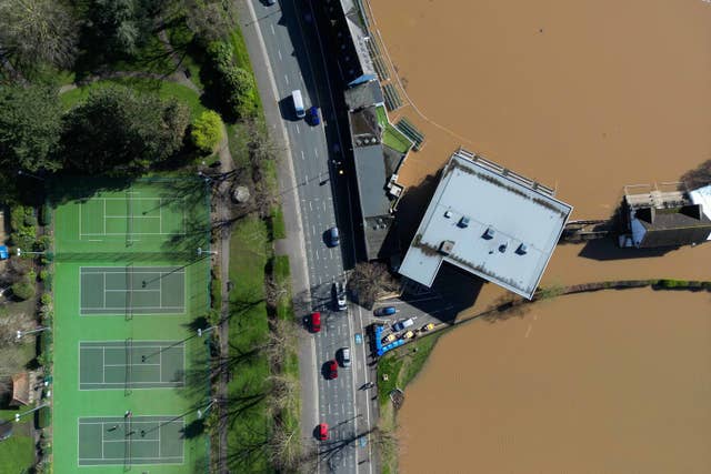 The Worcestershire County Cricket clubhouse surrounded by floodwater on Saturday morning (Jacob King/PA)