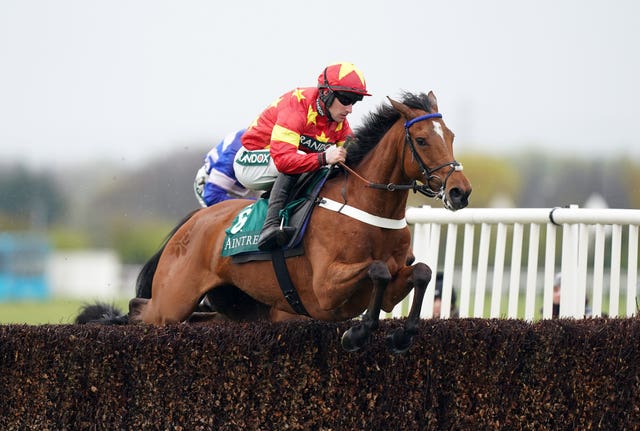 Minella Drama and Brian Hughes in action at Grand National meeting 