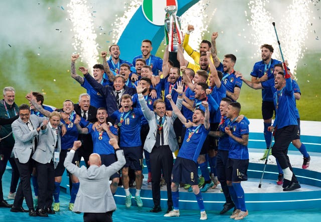 Italy captain Giorgio Chiellini lifts trophy 