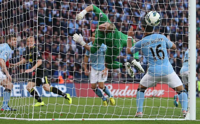 Ben Watson, second left, celebrates his winning goal for Wigan against Manchester City in the 2013 FA Cup final