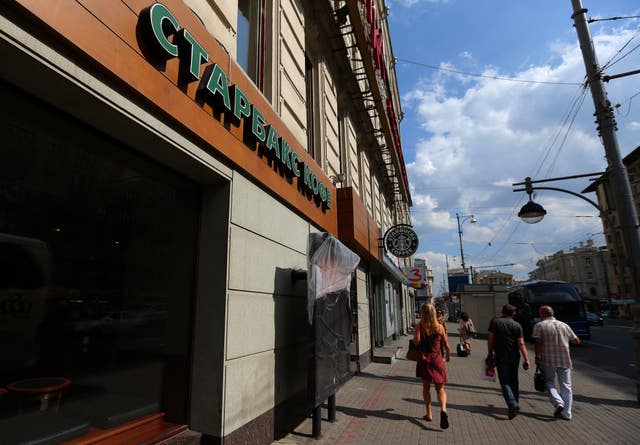 General view of a Starbucks Coffee shop sign in Moscow, Russia. (Dave Thompson/PA)