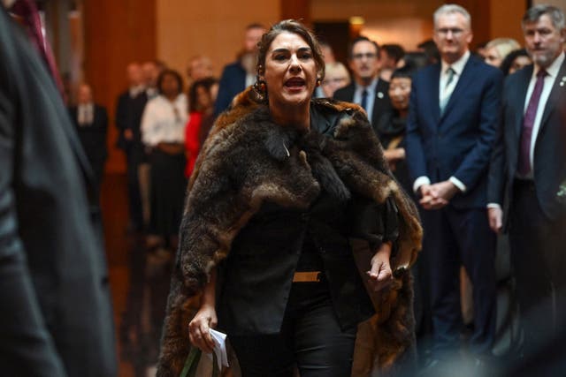 Australian senator Lidia Thorpe protests during the ceremonial welcome to Australia for Charles and Camilla at Australian Parliament House in Canberra