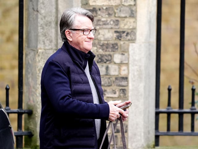 Lord Peter Mandelson smiling, pictured outside his home