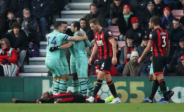 Arsenal celebrate after taking the lead at Bournemouth