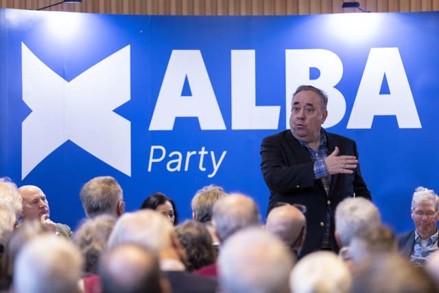 Alex Salmond making a speech with supporters in the foreground