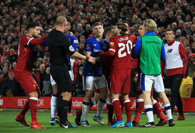 Several players from both teams became involved in keeping Roberto Firmino and Mason Holgate apart