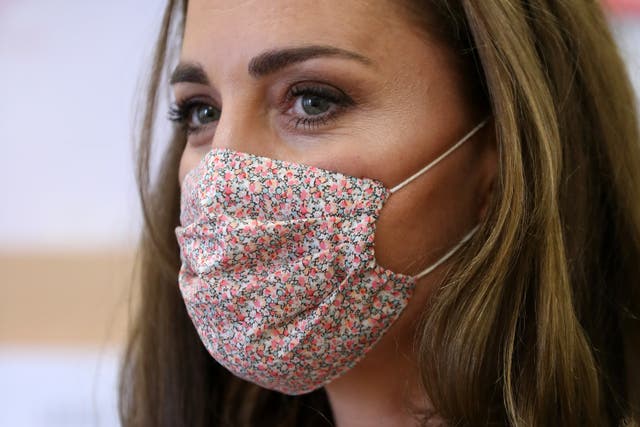 Kate picked a floral mask to wear to for the charity visit