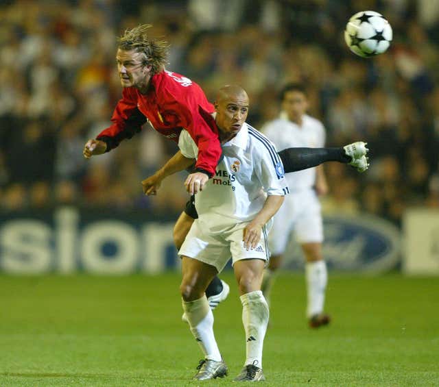 Carlos (right) made over 500 appearances for Real Madrid in an 11-year stint with them from 1996 to 2007 (Martin Rickett/PA).