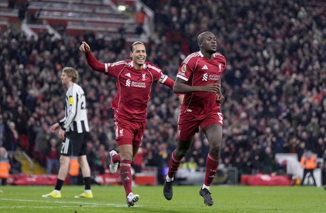 Ibrahima Konate celebrates scoring followed by Virgil van Dijk