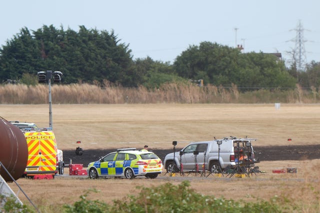 The scene at Southend Airport in Essex, where four people died when a plane crashed shortly after take-off on Sunday afternoon