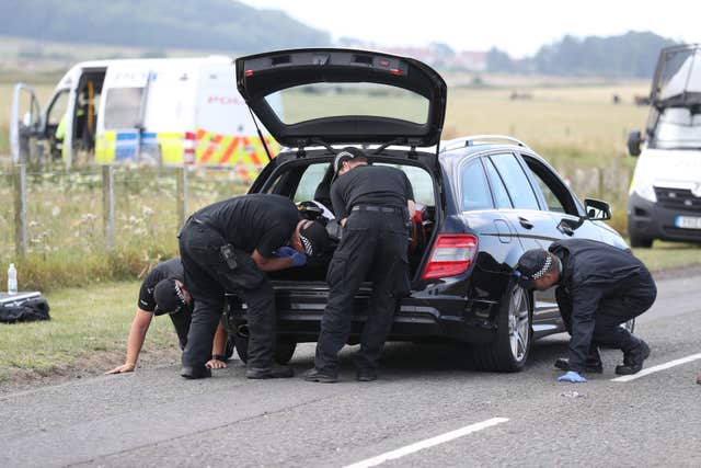 Police search cars 