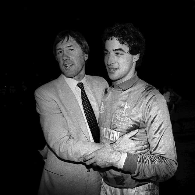 Tottenham manager Keith Burkinshaw (left) congratulates goalkeeper Tony Parks after a penalty shoot-out in the 1984 UEFA Cup final