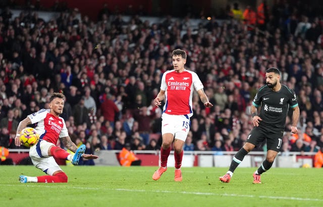 Mohamed Salah shoots as Ben White slides in to no avail as Liverpool equalise