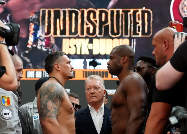 Oleksandr Usyk (left) and Daniel Dubois face off during their weigh-in 
