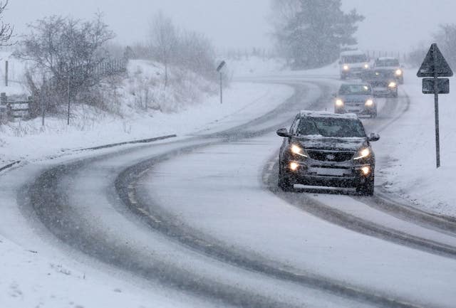 Drivers take care during heavy snow in Eshiels, in the Scottish Borders