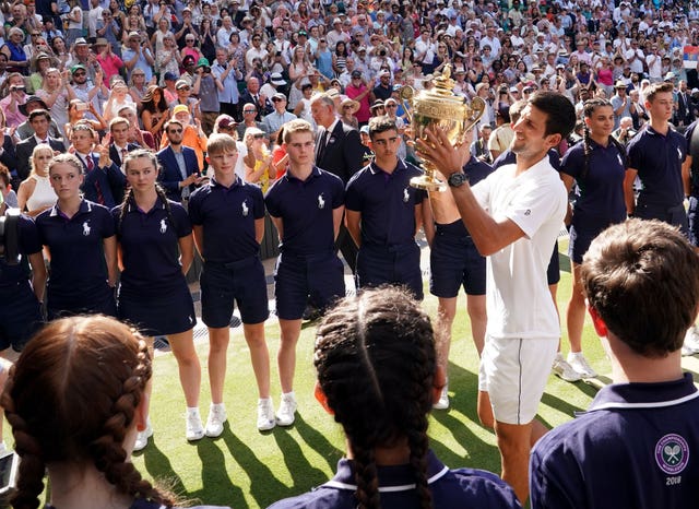 Novak Djokovic with the trophy after his Wimbledon success