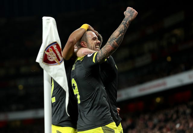 Danny Ings celebrates Southampton's second goal, scored by James Ward-Prowse 