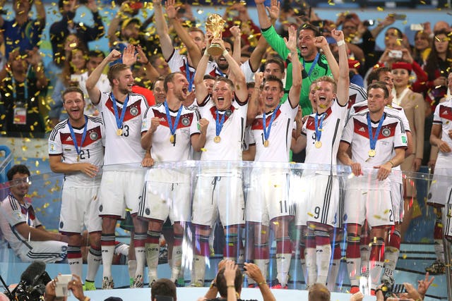 Germany players lift the World Cup trophy at the 2014 World Cup