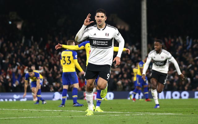 Aleksandar Mitrovic celebrates scoring Fulham's third - and decisive - goal