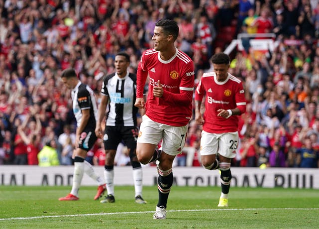 Ronaldo celebrates after scoring on his second United debut (Martin Rickett/PA).