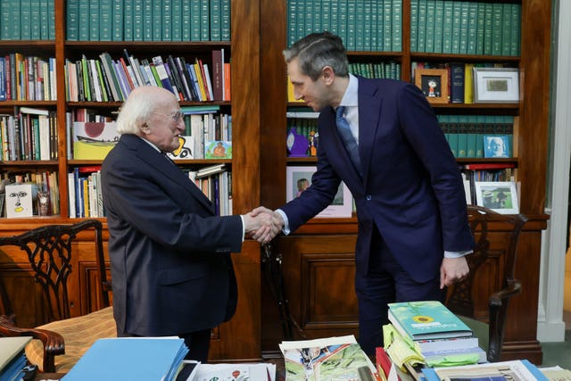 Irish President Michael D Higgins with Simon Harris in Aras an Uachtarain where he formally tendered his resignation as Taoiseach 