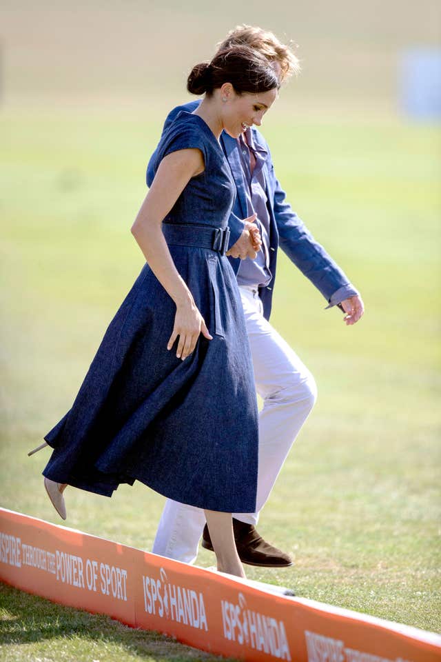 Meghan stomping on polo divots