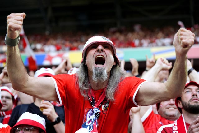 An Austrian fan shows his excitement at Euro 2024