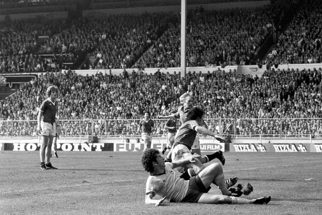 Alan Sunderland slides in to score a dramatic winner in the 1979 FA Cup final. (PA Archive/PA Images)
