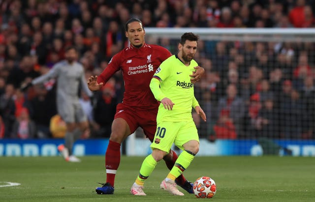 Barcelona' Lionel Messi (right) in action