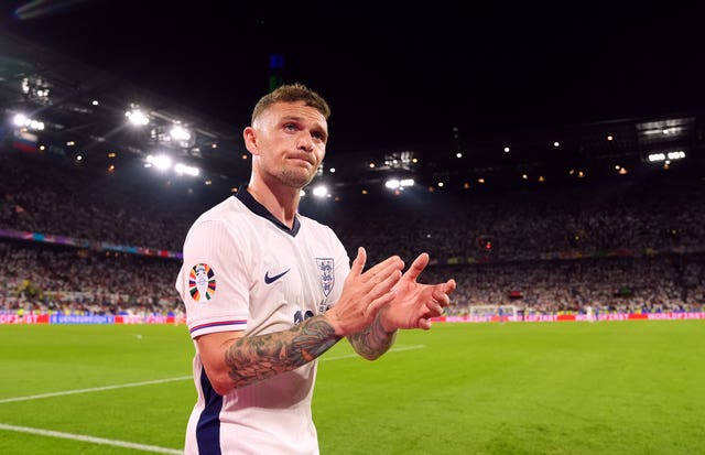 Kieran Trippier applauds the fans