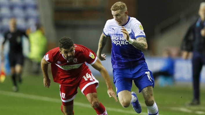 James McClean and Tommy Smith battle for the ball (Will Matthews/PA)