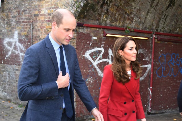 The Duke and Duchess of Cambridge during a visit to view some of the images from the Hold Still photography project at Waterloo Station in London. Evening Standard/Jeremy Selwyn