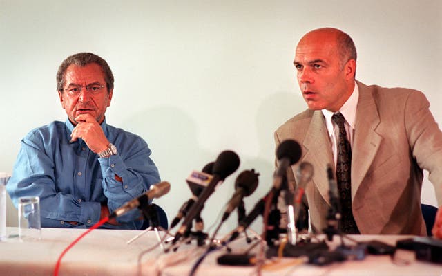 Swiss coach Christian Gross (right) lasted less than a year in the job