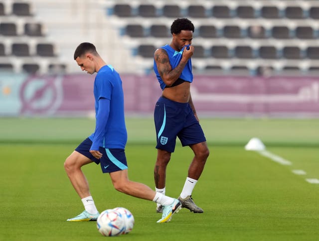 Sterling (right) missed England's win over Qatar