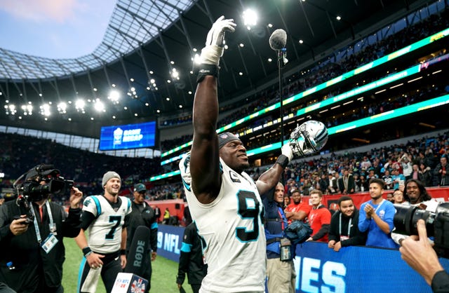 Efe Obada, who used to live on the streets in London, walks off at Tottenham Hotspur Stadium after captaining the Carolina Panthers to victory over the Tampa Bay Buccaneers 
