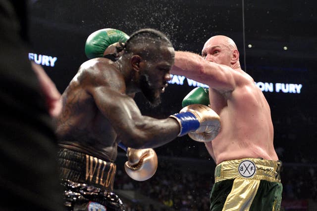 Tyson Fury, right, felt he should have stopped Deontay Wilder inside six rounds