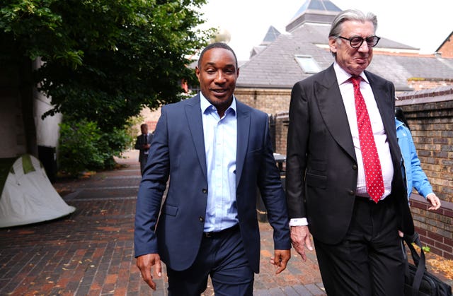 Paul Ince walking outside a court building