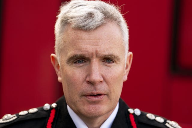 A close-up of London Fire Brigade Commissioner Andy Roe in uniform