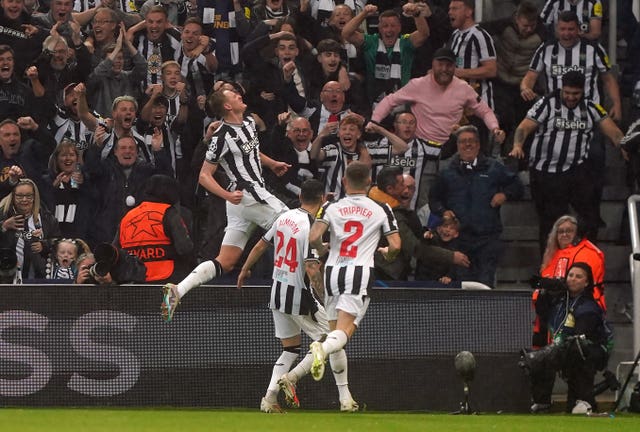 Newcastle’s Sean Longstaff celebrates after scoring against Paris St Germain