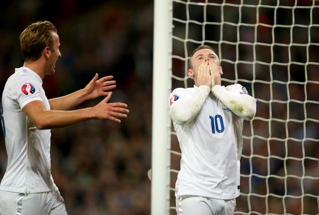 Rooney took a moment to reflect on his achievements, a 50th England goal breaking a record which had stood for 45 years. (Mike Egerton/PA)