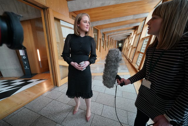 Mairi McAllan speaking to the media at Holyrood