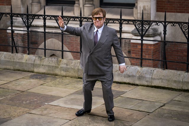 Sir Elton John leaves the court on Monday 