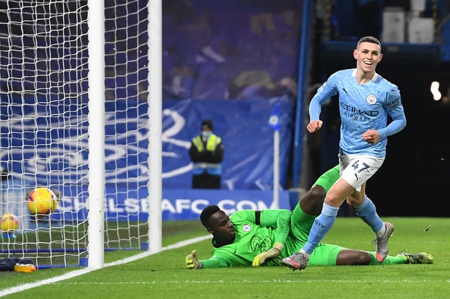 Phil Foden scores Manchester City's second goal during their 3-1 win at Chelsea