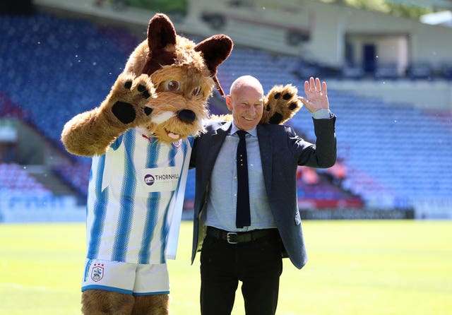 Sir Patrick Stewart with Huddersfield Town mascot Terry the Terrier