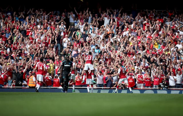 Alexandre Lacazette celebrates with Arsenal's fans 