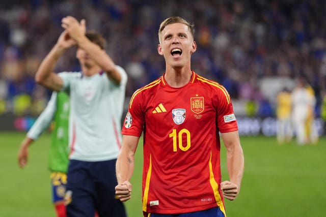 Dani Olmo celebrates on the pitch