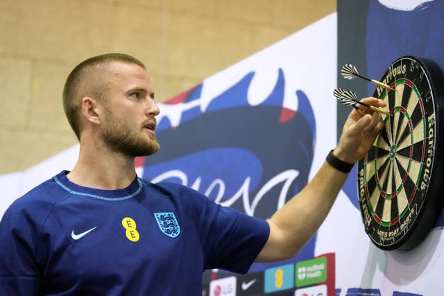 Eric Dier playing darts during his media access