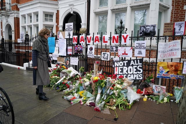 Floral tributes outside the Russian embassy in London for Alexei Navalny, who died on Friday 